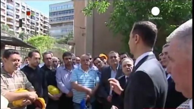 Defiant Assad visits Damascus power plant
