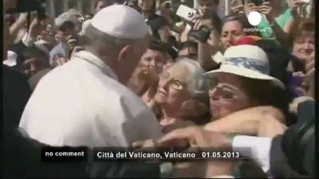 Pope Francis almost kisses crying baby - no comment
