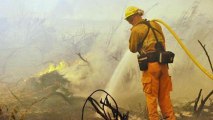 Wildfires sweep through southern California