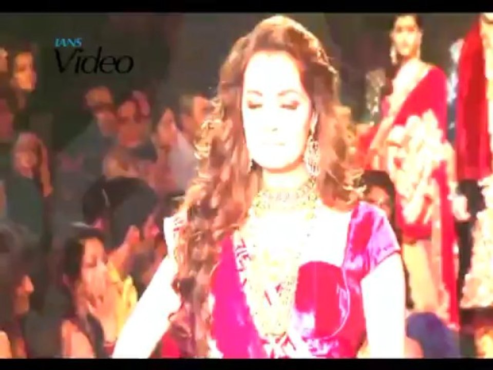 Dia walks the ramp as bride