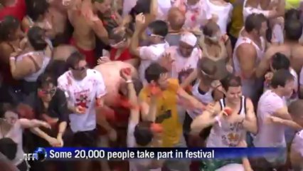 Revellers take part in Spain's annual tomato fight