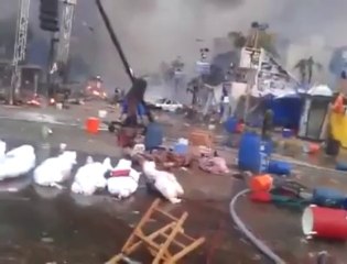 جثث شهــداء رابعــة قبل حرقهـــا