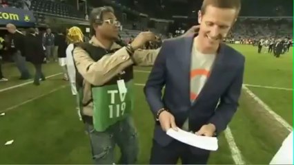Danish TV's Peter Møller taken out by Lars Jacobsen's slide tackle after Copenhagen won the league