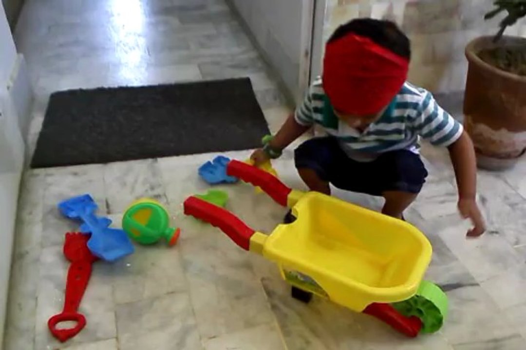 baby shafey khan watering plants