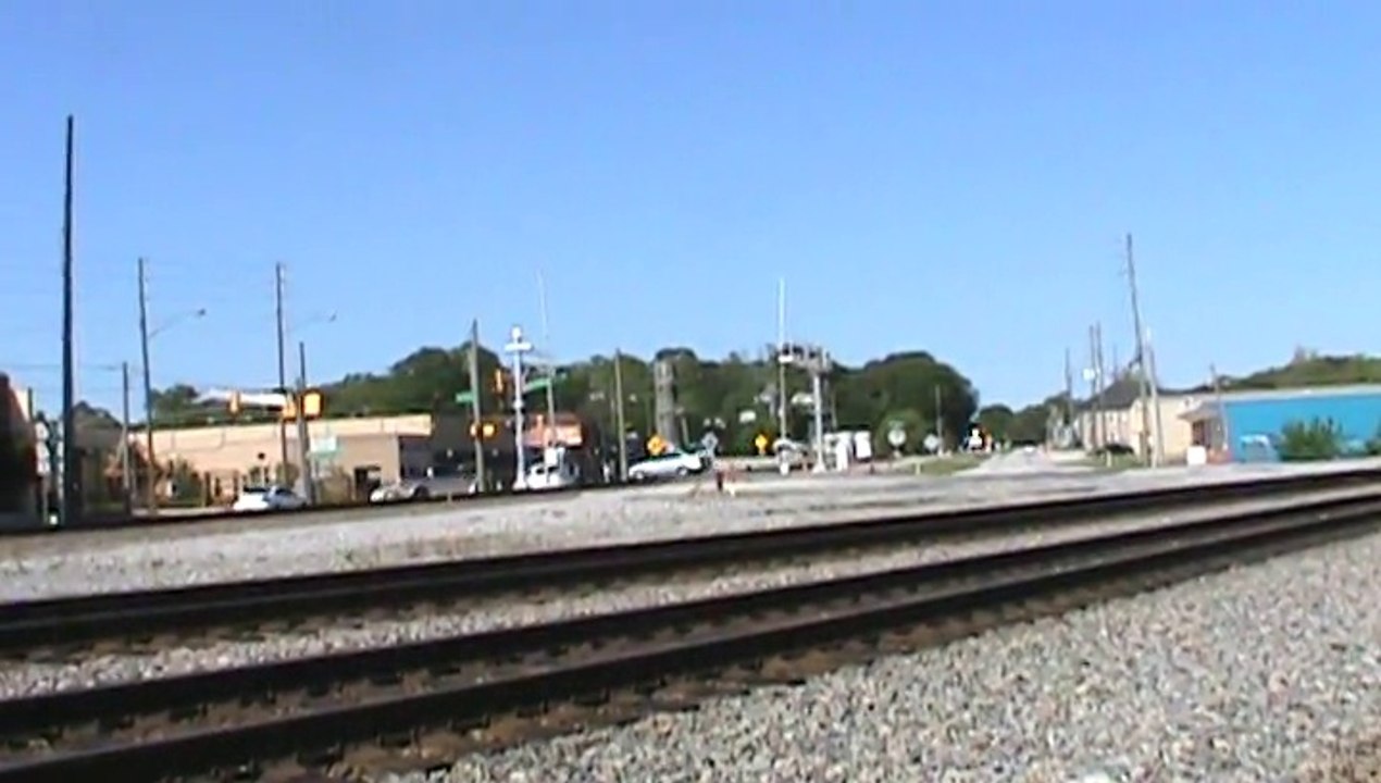 Train meet in Austell Ga. one KCS intermodal west and one Norfolk Southern rail train