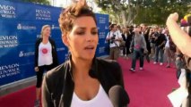 Halle Berry gets her bump out
