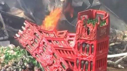 Flames engulf Coca Cola depot in India