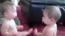 Twin babies fight over pacifier - Must watch