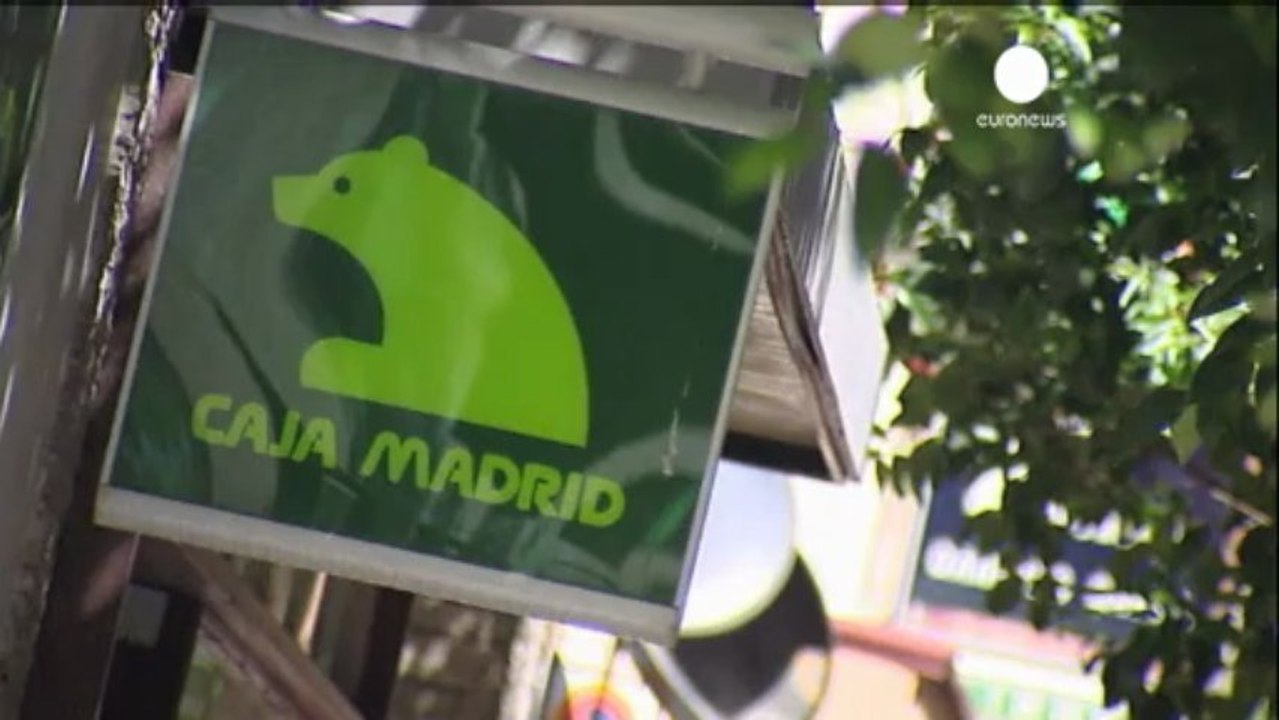 Spain: Banker freed as inquiry continues