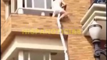 Amante se escapa por ventana mientras la pareja discute en el balcón en Brasil!!