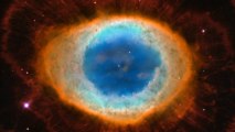 Zooming in on Messier 57, the Ring Nebula