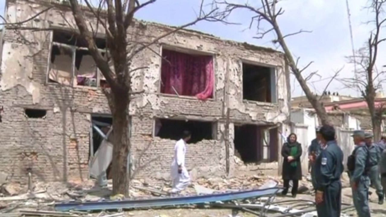 Residents clear up after Taliban attack