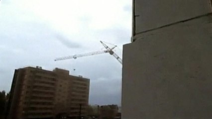 Crane collapse into Russian apartment building
