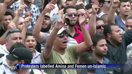 Tunisia feminist on trial, topless protesters held