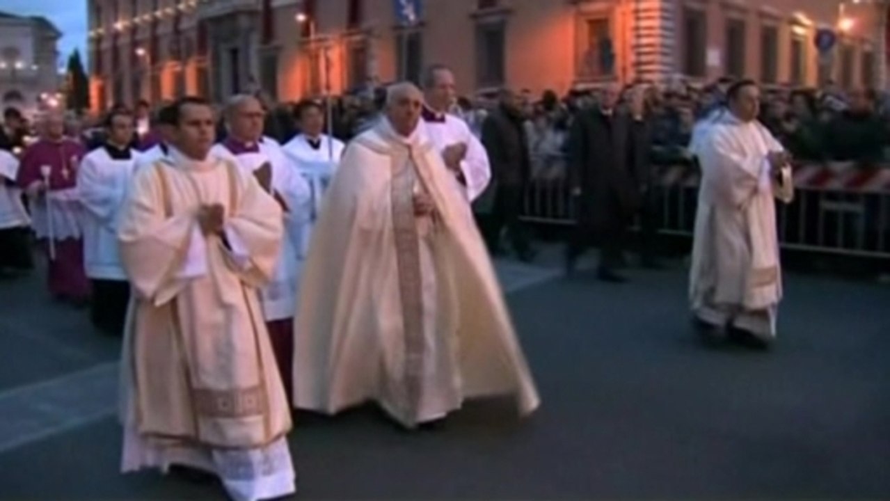 Pope Francis walks in Roman procession