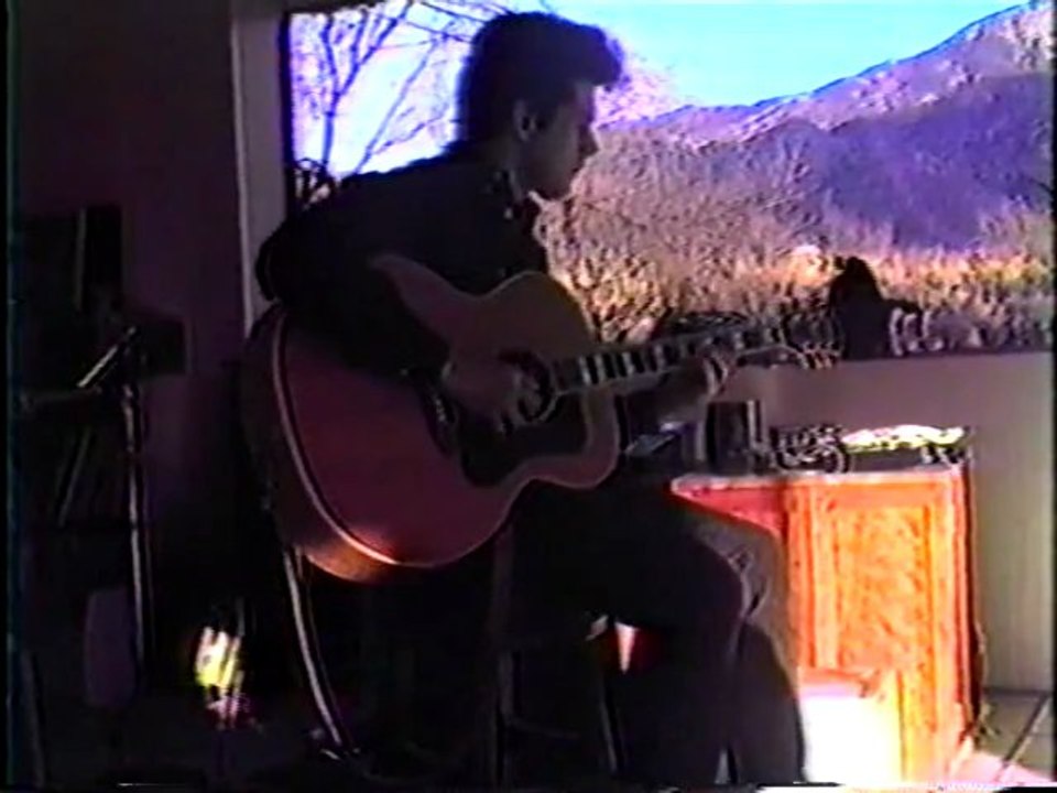 joe nania at the x-9 ranch in vail arizona  trying out a guild f-50 guitar owned by friend  web slate