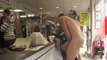 Strip Tease at the dry-cleaner's caught on camera