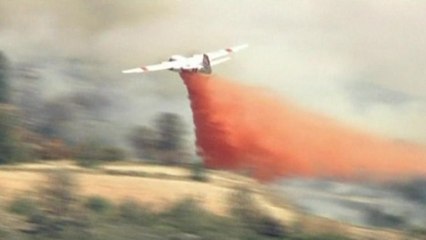 Wildfires continue to burn