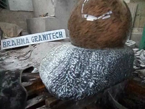 small rock fountains,rock water features,rock globes