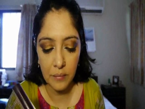 bronze smoky eye makeup tutorial with a pink lip