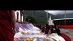 Monks performing the ceremony of unfurling the Thangka outside the monastery in Bhutan