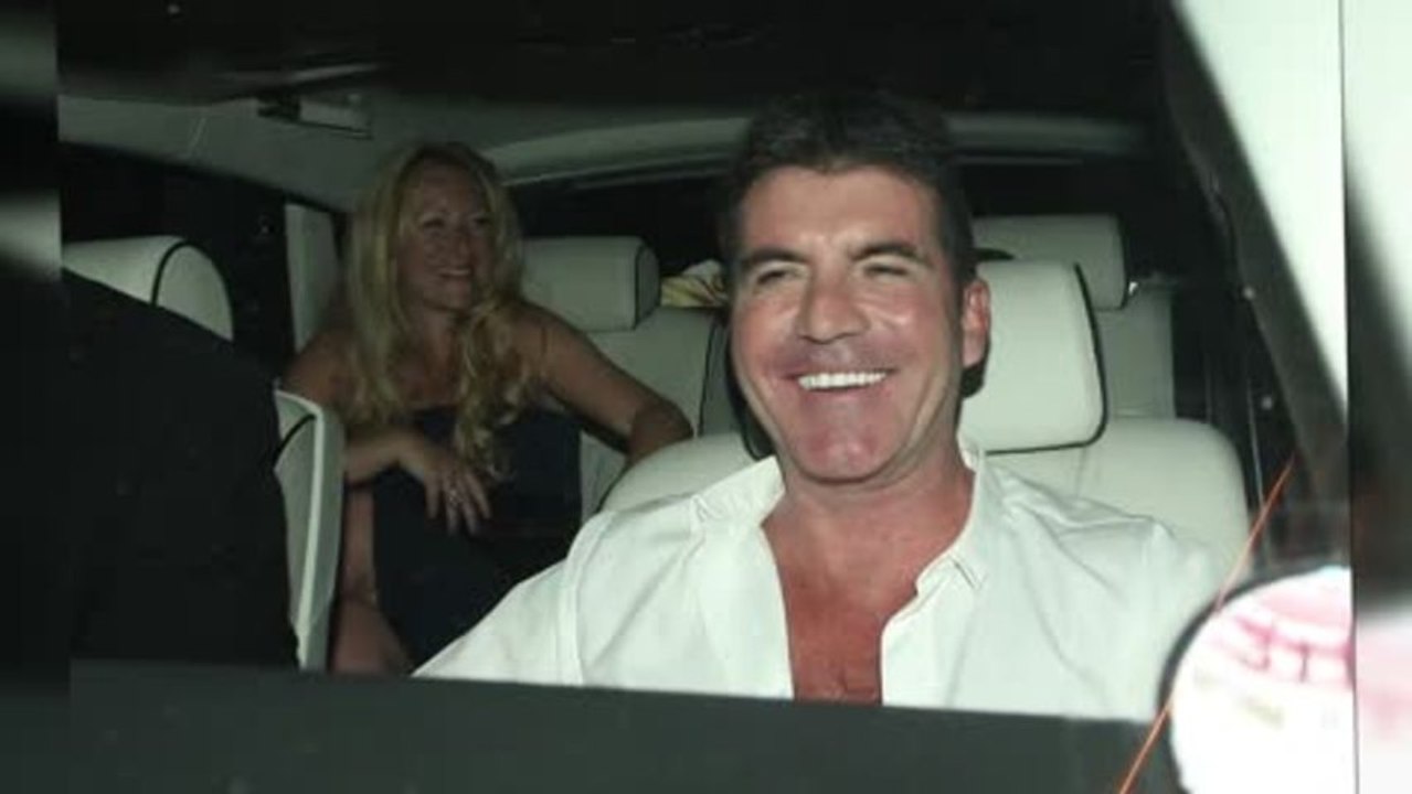 Simon Cowell Celebrates Britain's Got Talent Final After Egg Attack