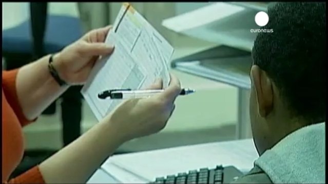 British job market perks up, real wages down