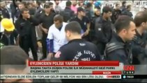 Yaralı polise eylemciler yardım etti