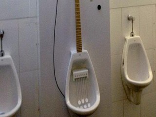 WTF Play Guitar While You PEE