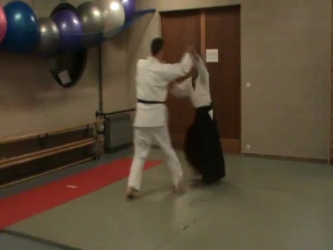 Yokomen uchi shiho nage ura ki no nagare