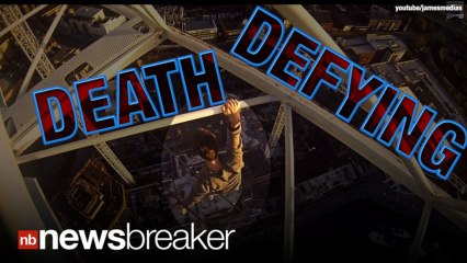 INSANE: Man Dangles With One Hand From 250 Foot Crane... On Purpose!