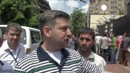 Egyptians react to Mursi decision to cut ties with Syria