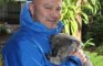 Brian Moore: Lion cuddles a koala Down Under!