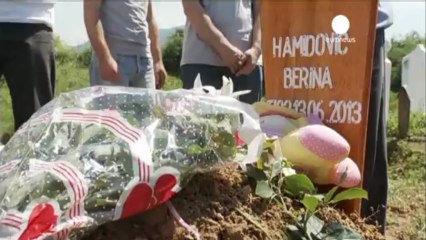 More ID row protests in Bosnia as baby victim is buried