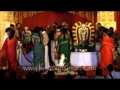 Devotees offering prayers to Tirupati