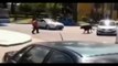 Amazing Man TACKLES BULL after it escapes in Spain. red T-shirt