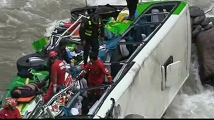Bus plunges into river in central Peru