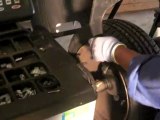 Changing the tire using the tire changer and tire balancing machine 8