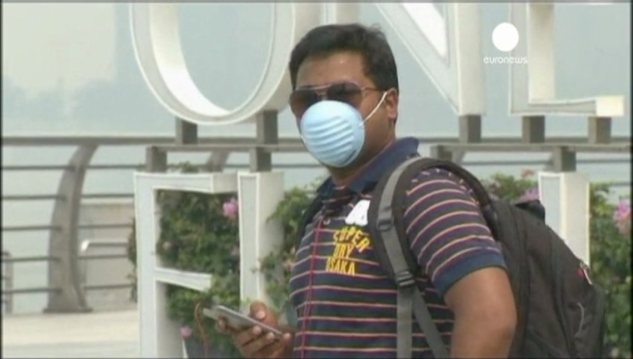 Singapour noyée dans un brouillard de fumée