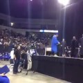 Graduating student celebrates with a backflip