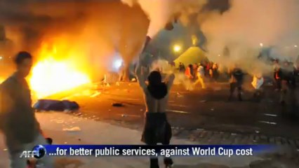 Riot police clash with protesters in Rio street battles