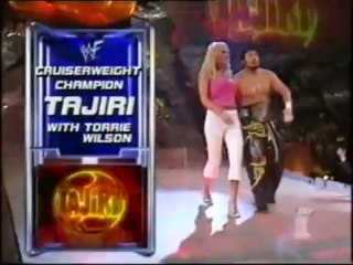 Edge & Tajiri w/Torrie Wilson vs. Booker T & Test