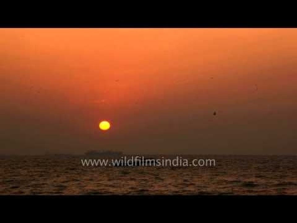 Reddish tinge of sunset over Arabian Sea