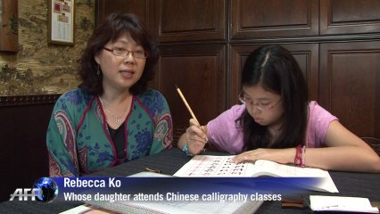 In Asia, ancient writing collides with digital age