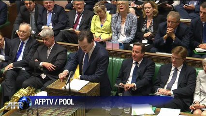 Britain slashes public spending for election year