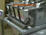 Automatic weighing and packing machine