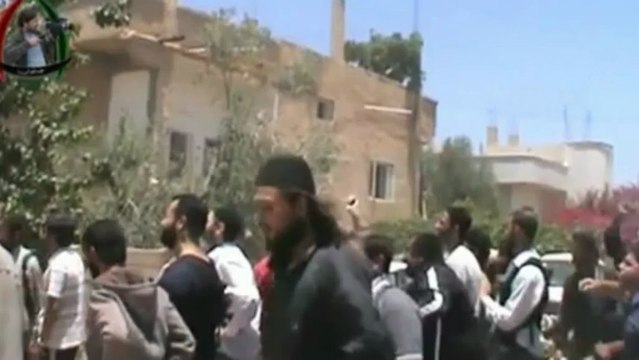 Syrian rebels demolish tower block