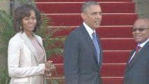 Obama meets with Mandela family, praises former leader