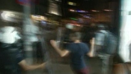 Turkish riot police charge into demonstrators