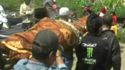 Indonesia quake toll rises